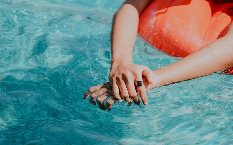 a person's feet in the water