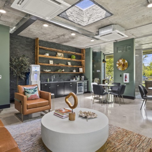 a resident lounge and kitchen area with natural light