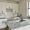 kitchen with ample counter-space, modern appliances and bright lighting