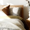 modern bed beside decor